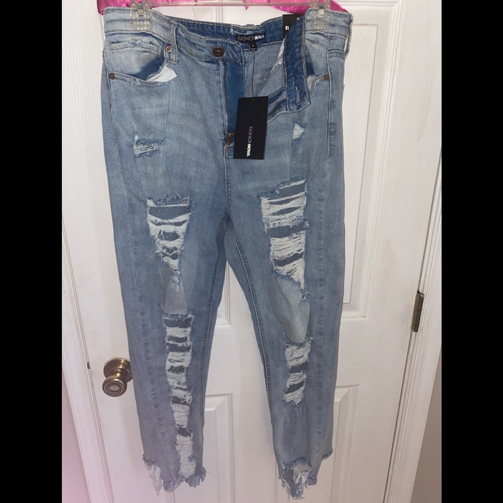 DESTROYED BOYFRIEND JEANS. size 13.